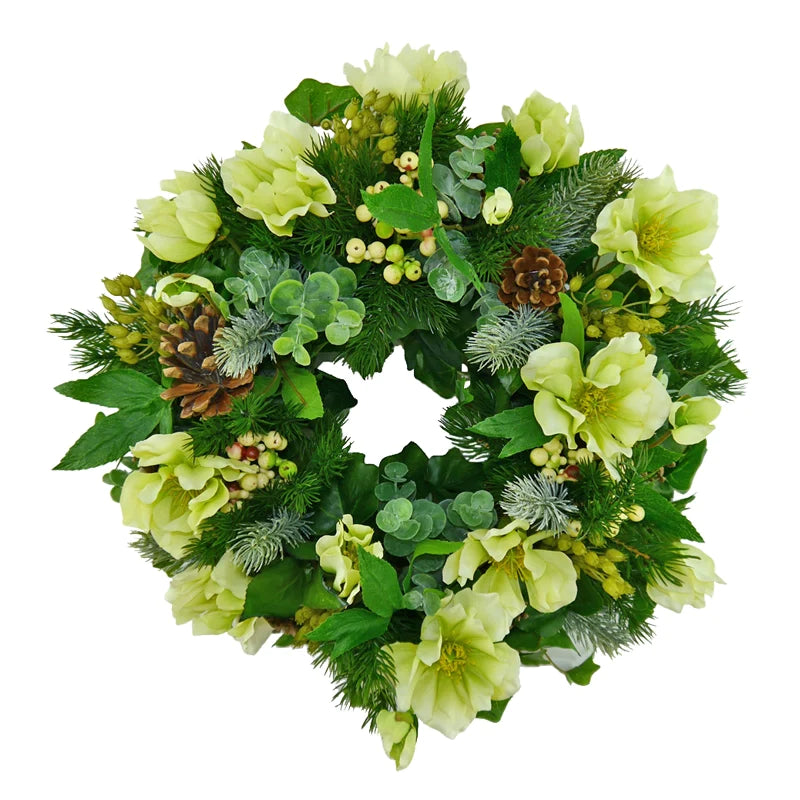 Winter wreath with Christmas rose berries and cones