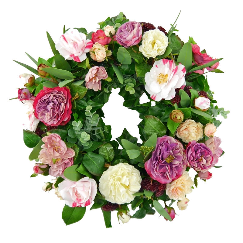 Flower wreath of roses and camellias with sedum eucalyptus and ivy