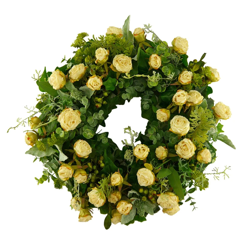 Floral wreath of autumn roses with eucalyptus and berries