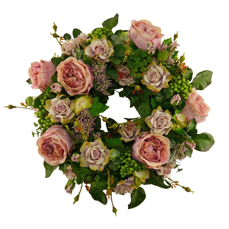 Flower wreath roses with hydrangeas and berries