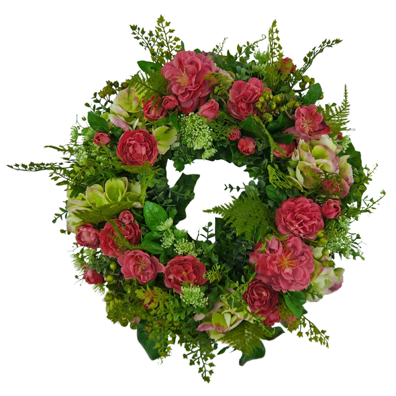 Flower wreath of moss roses with hydrangeas and berries